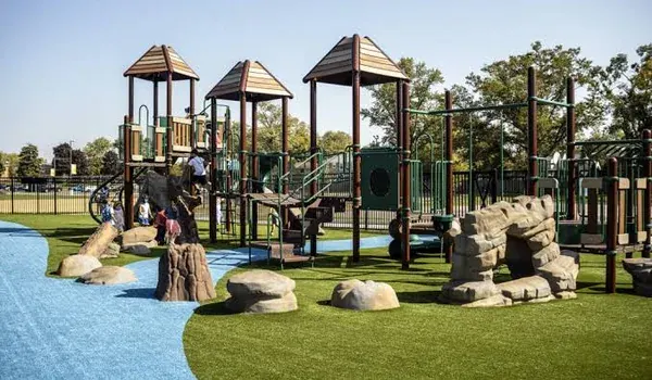 Landscaped garden with lawns, trees and walking pathways in a residential development