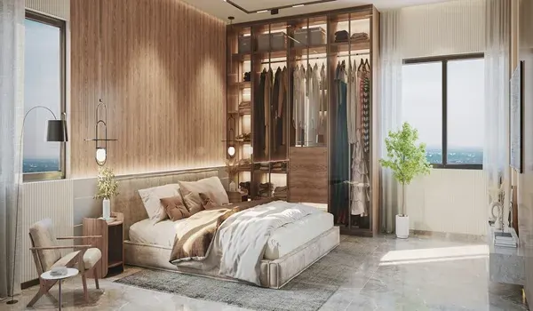 Second bedroom with a double bed, wardrobe and a window overlooking greenery