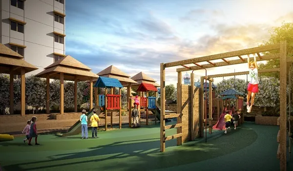 Children's play area with climbing frames, slides and soft safety surfacing